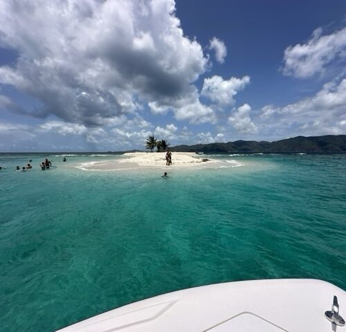 Pulling up to Sandy Spit on Jost Van Dyke on the sister boat the Rockstar St John boat charters