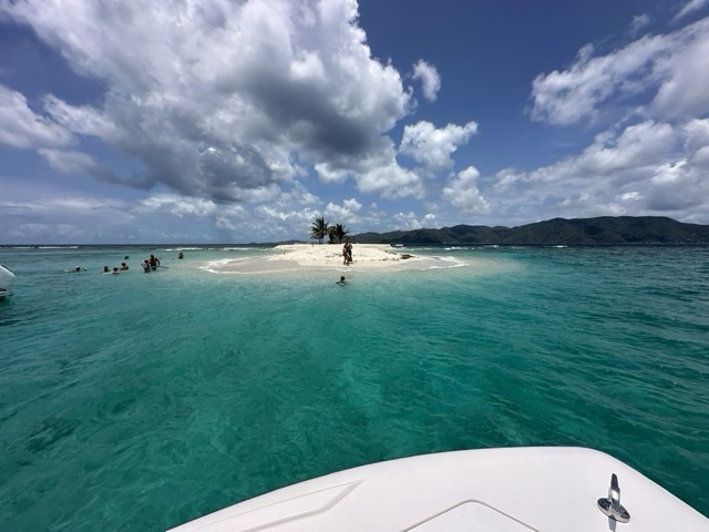 Pulling up to Sandy Spit on Jost Van Dyke on the sister boat the Rockstar St John boat charters