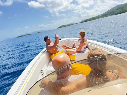 captained boat charter guests enjoying the day